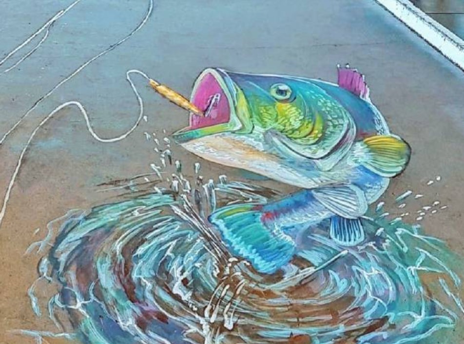 a3D painting of a fish on the pavement