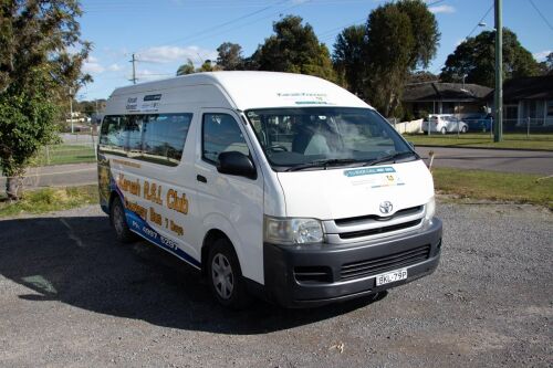 white van parked in parking lot