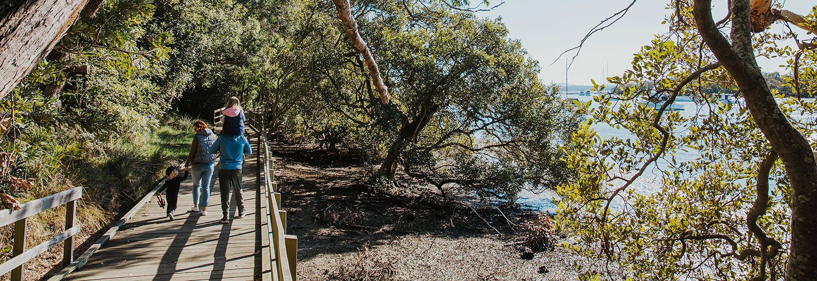 Family at Tomaree coastal walk banner image