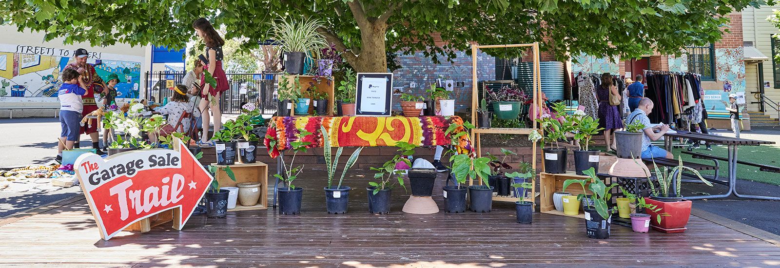 a garage sale stand banner image