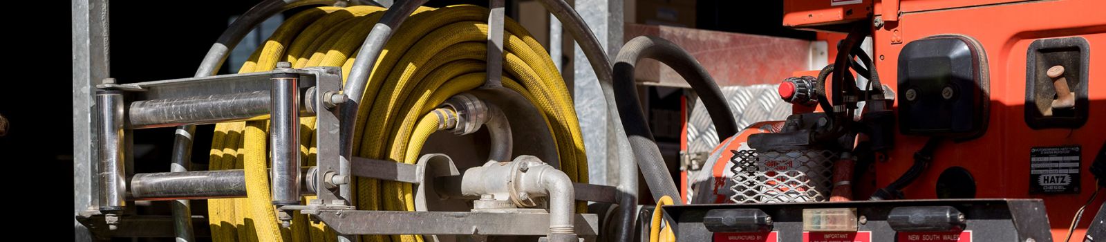 Image of a petrol tanker and hose banner image