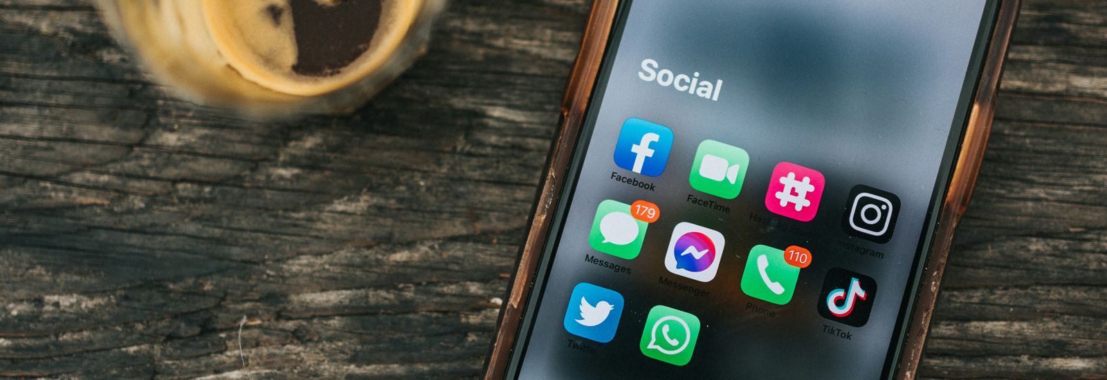 Smartphone showing social media icons banner image