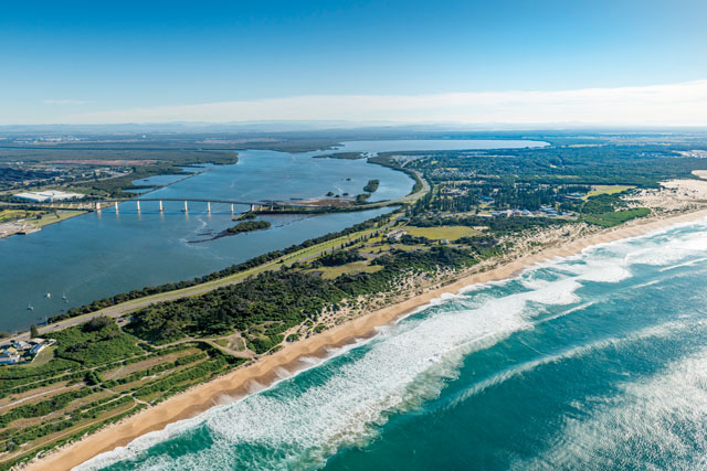 Aerial shot of Stockton and Fern Bay looking north along the coastline