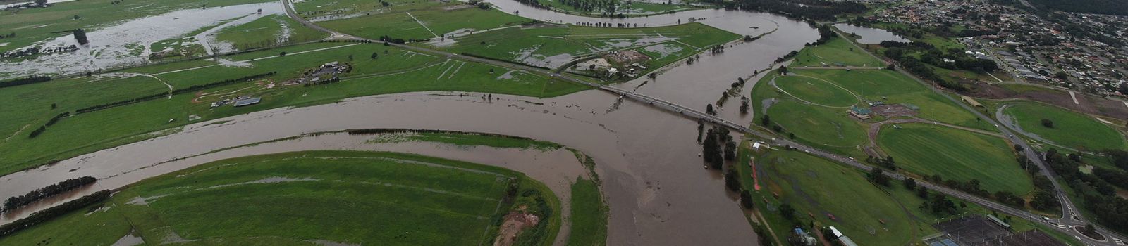 Aerial photograph looking over a flooded Raymond Terrace banner image