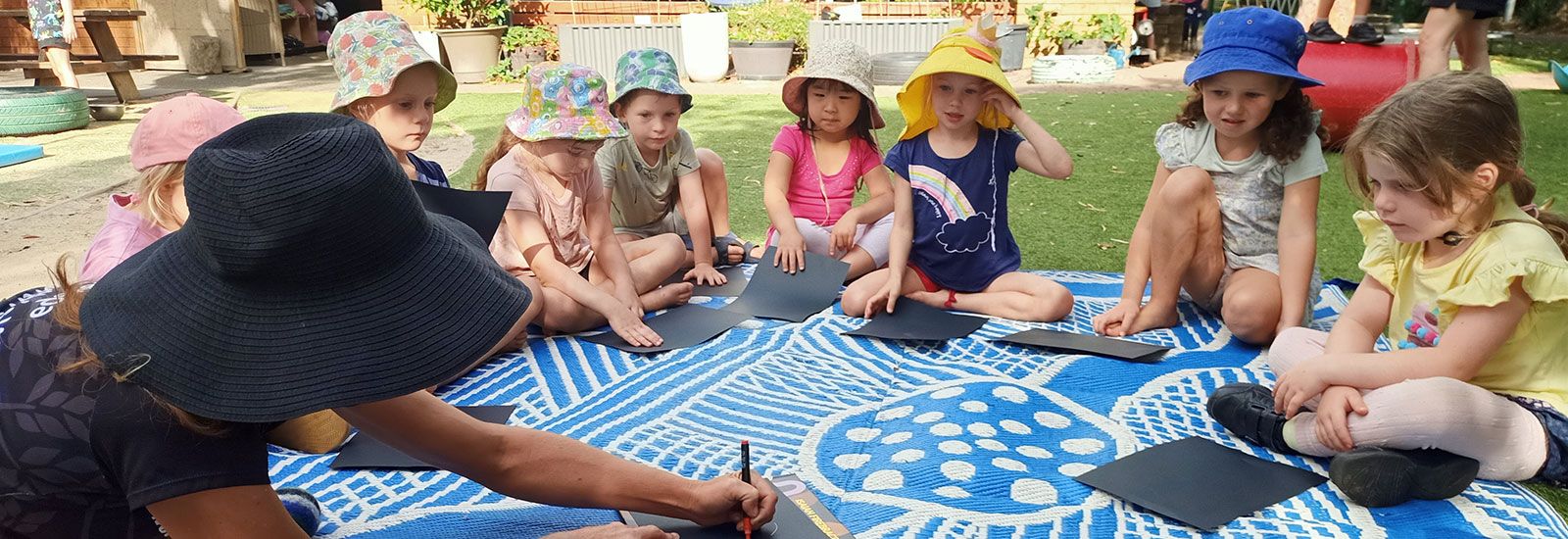 Sarah Corrigan with preschool children banner image