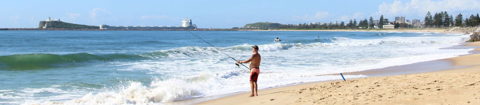 Photograph of fisherman along north stockton and fern bay beach  banner image