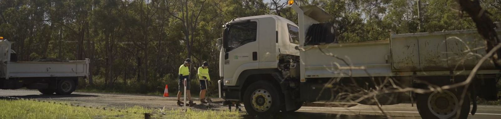 Port stephens Council truck and workers reparing the road banner image