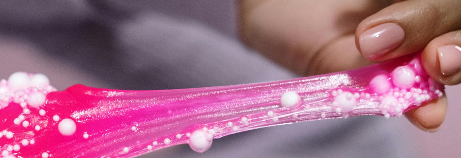 Pink slime being stretched banner image