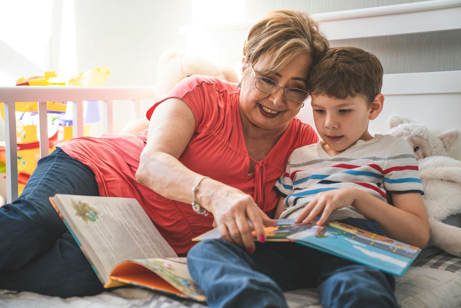 grandmother reading a story to their grandson banner image