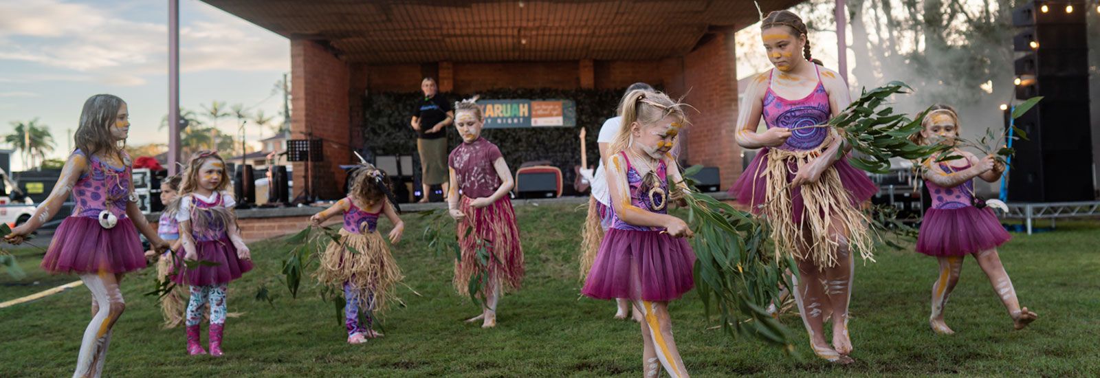 Girls dancing at the Karuah by Night festival banner image