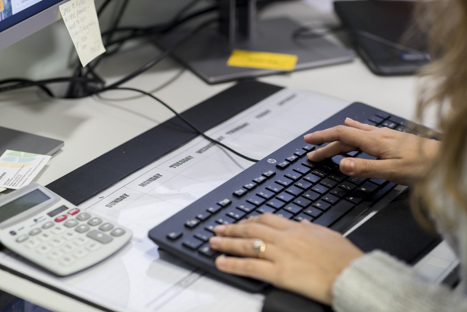 woman typing on keyboard banner image