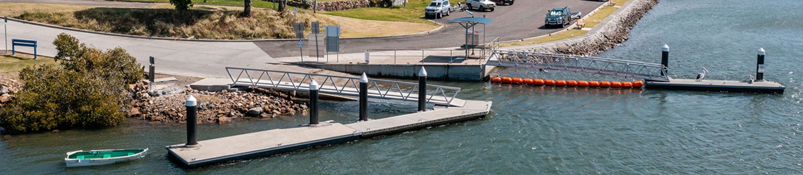 Image of a boat ramp on a river banner image