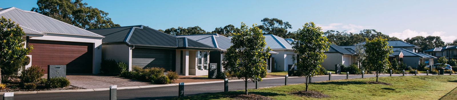 Photograph looking along a row of houses in medowie  banner image