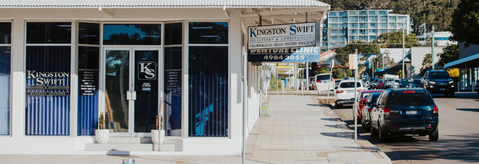 Cars parked in Nelson Bay town centre banner image