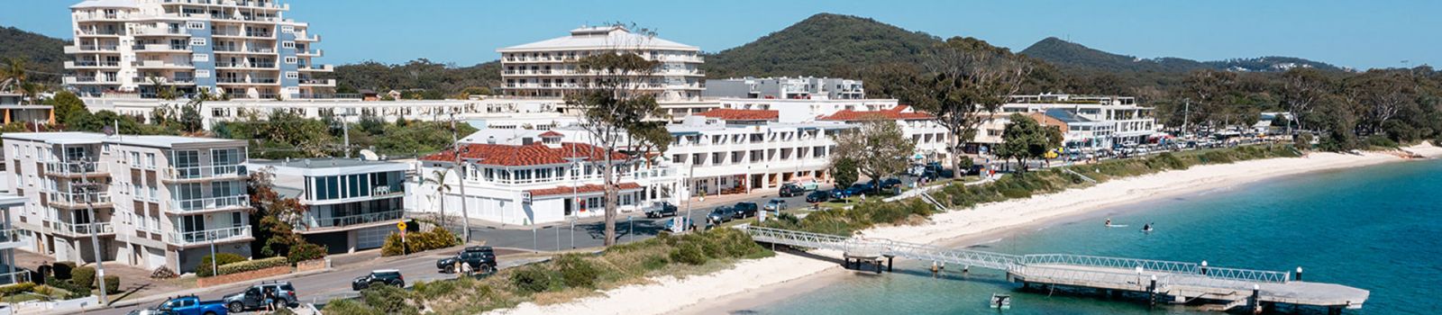 Image of looking Nelson Bay wharf and building developments banner image