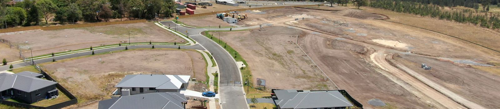 Image of a construction site with houses being built banner image