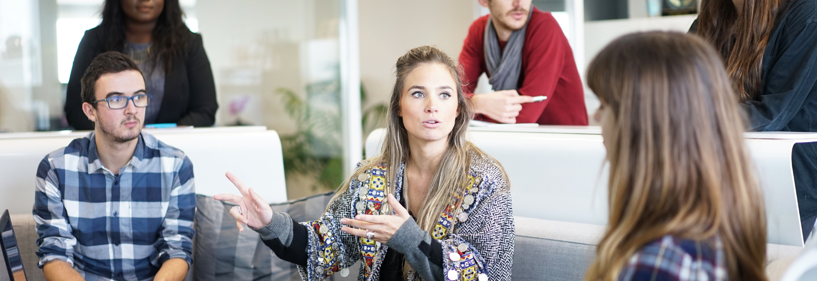 Group of colleagues in a business meeting banner image