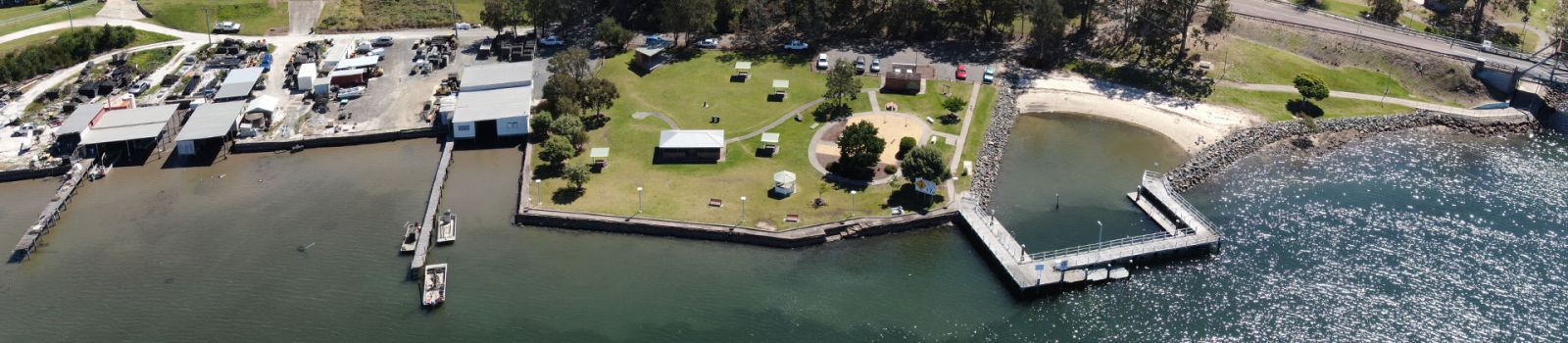 Aerial image overlooking a bay in Port Stephens  banner image